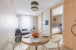 Apartment, 1 Bedroom | Living area | Flat-screen TV