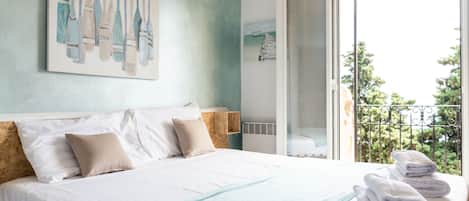 Apartment, 1 Bedroom, Sea View, Garden Area | In-room safe, blackout drapes, iron/ironing board, free WiFi