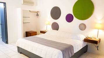 Room, 1 King Bed, Non Smoking | Individually decorated, laptop workspace, blackout drapes