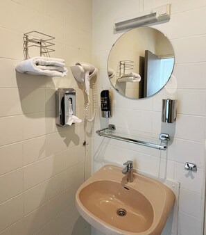 Shower, free toiletries, hair dryer, towels