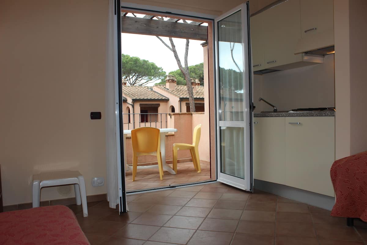 Studio, Terrace | Living area | TV