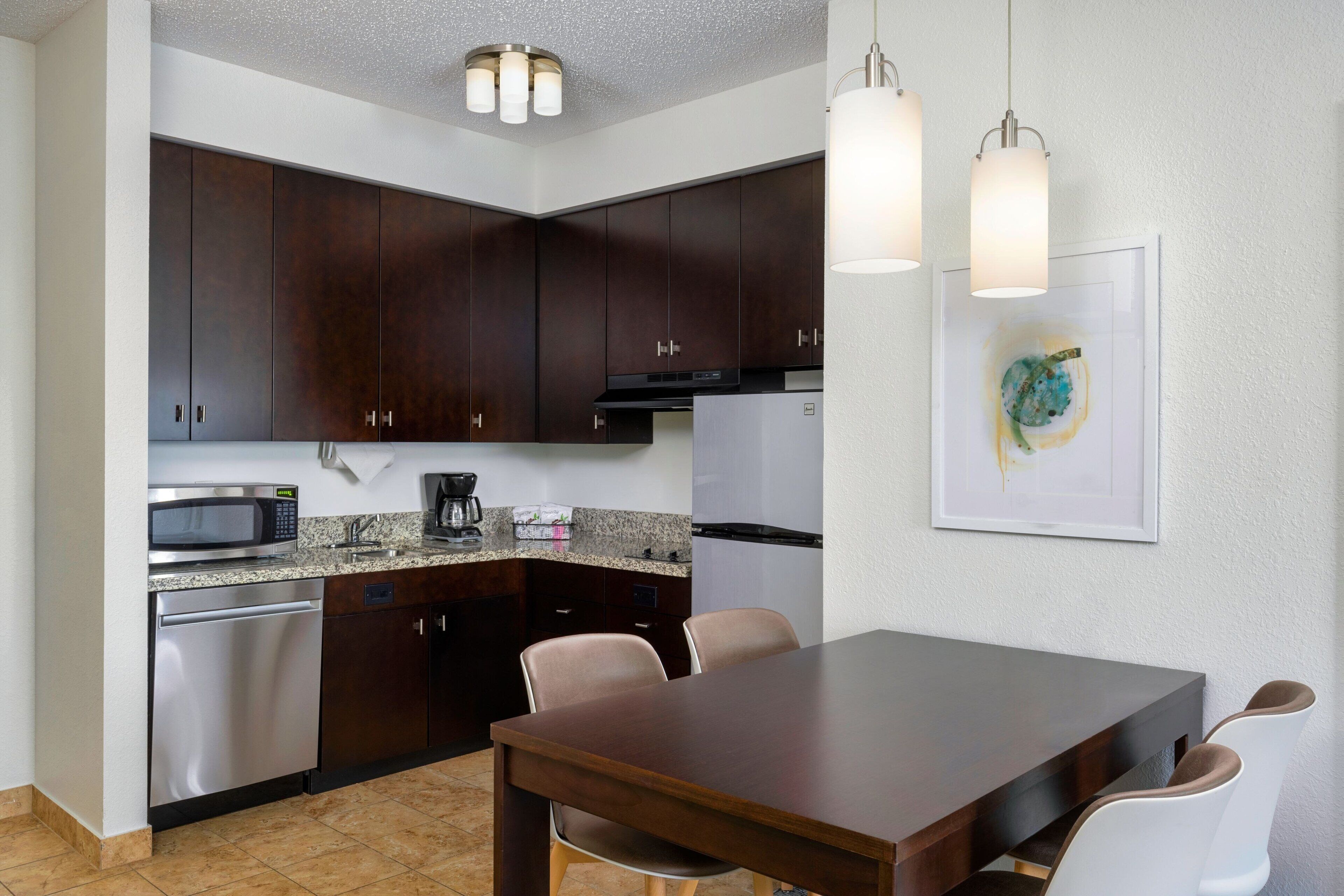 suite, 2 bedrooms | desk, blackout curtains, iron/ironing board, free cots/infant beds