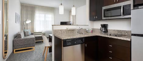 Suite, 2 Bedrooms | Private kitchen | Fridge, microwave, stovetop, dishwasher