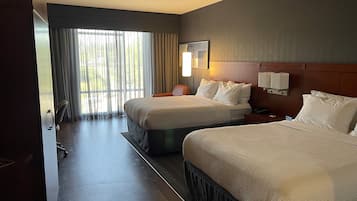 Down comforters, pillowtop beds, desk, laptop workspace