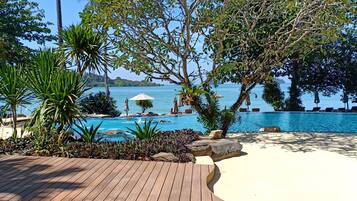 2 outdoor pools, pool umbrellas, pool loungers