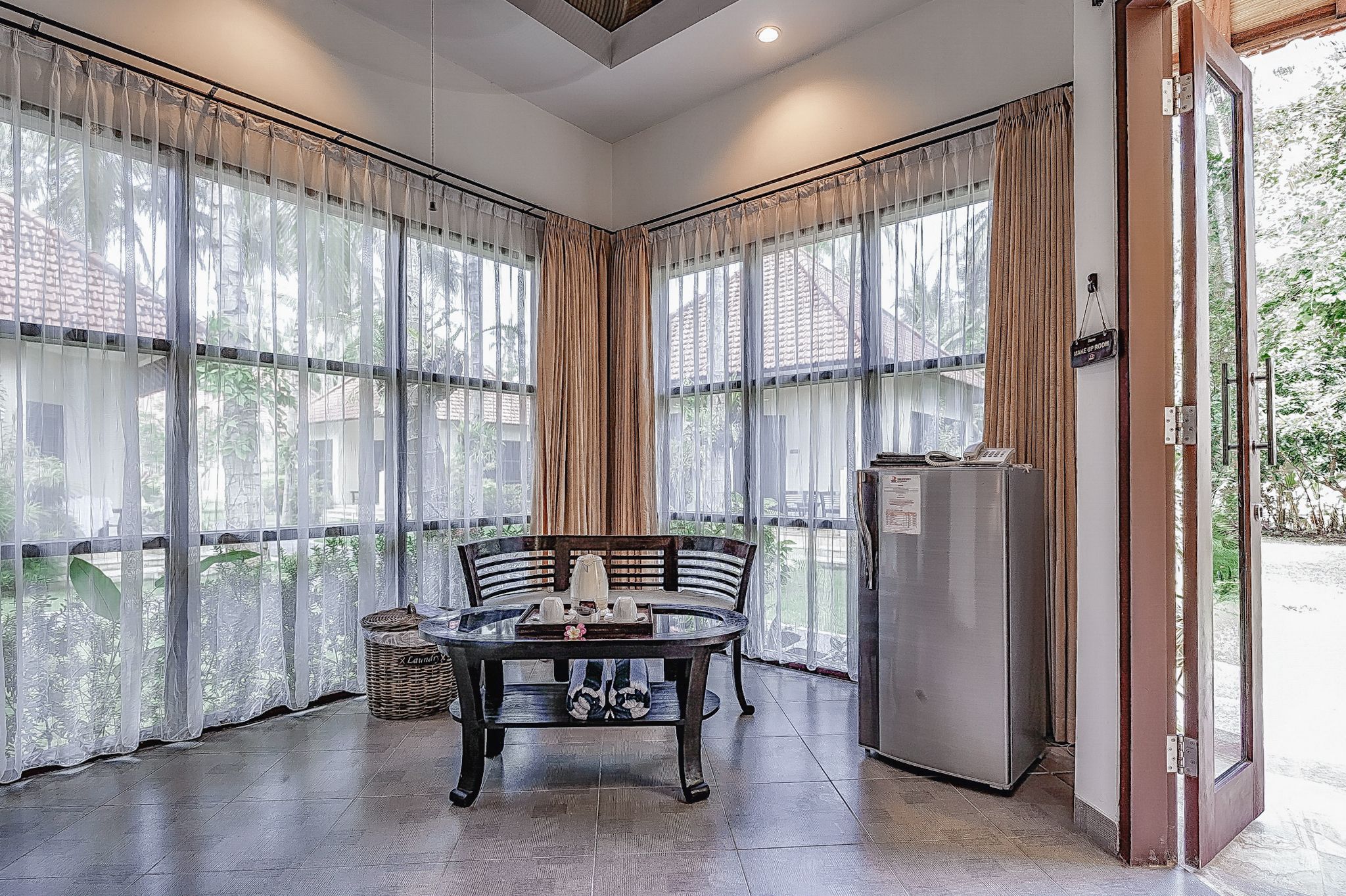 deluxe cottage | living area | 32-inch led tv with satellite channels, tv, dvd player