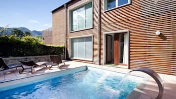Outdoor pool, pool umbrellas, pool loungers