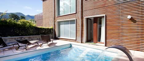 Outdoor pool, pool umbrellas, pool loungers