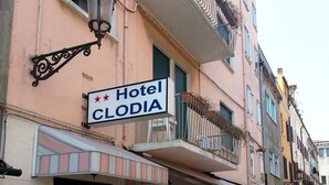 A hotel named "Hotel Clodia" with outdoor seating and a visible entrance. - Hotel Clodia (Chioggia)