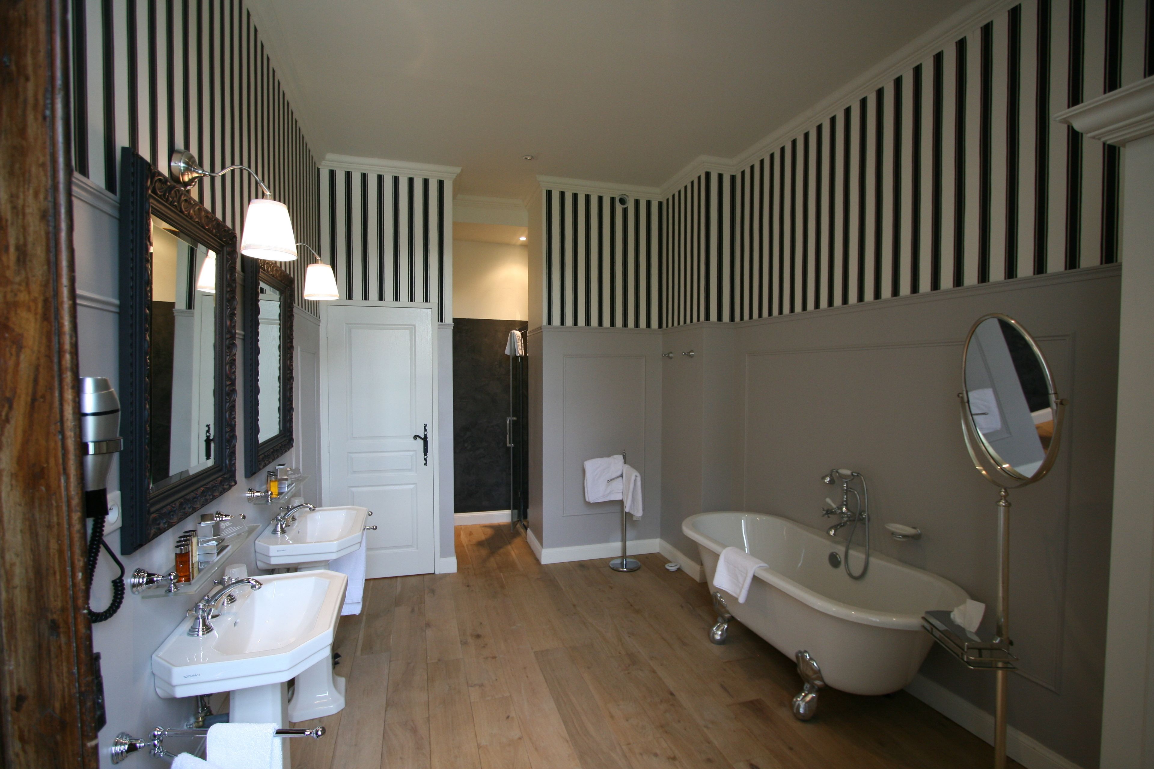 junior suite | bathroom | designer toiletries, hair dryer, towels