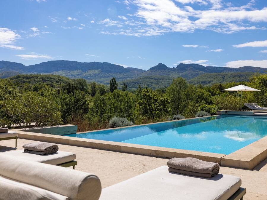 2 outdoor pools, pool umbrellas, pool loungers