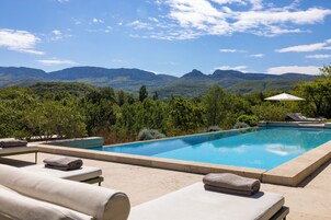 2 outdoor pools, pool umbrellas, pool loungers