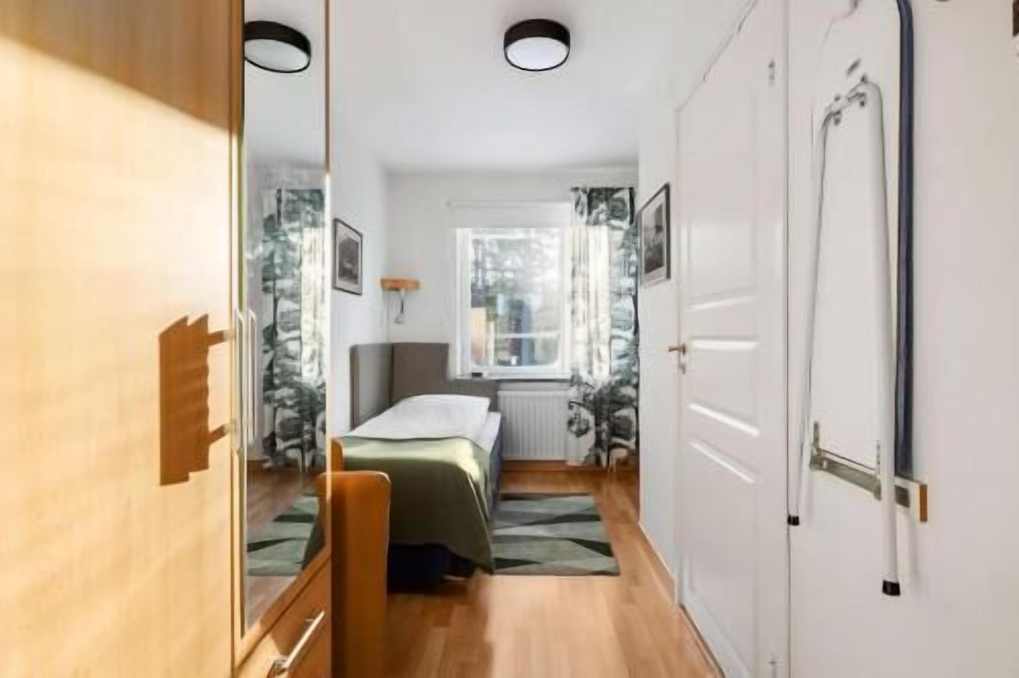 Desk, laptop workspace, iron/ironing board, rollaway beds