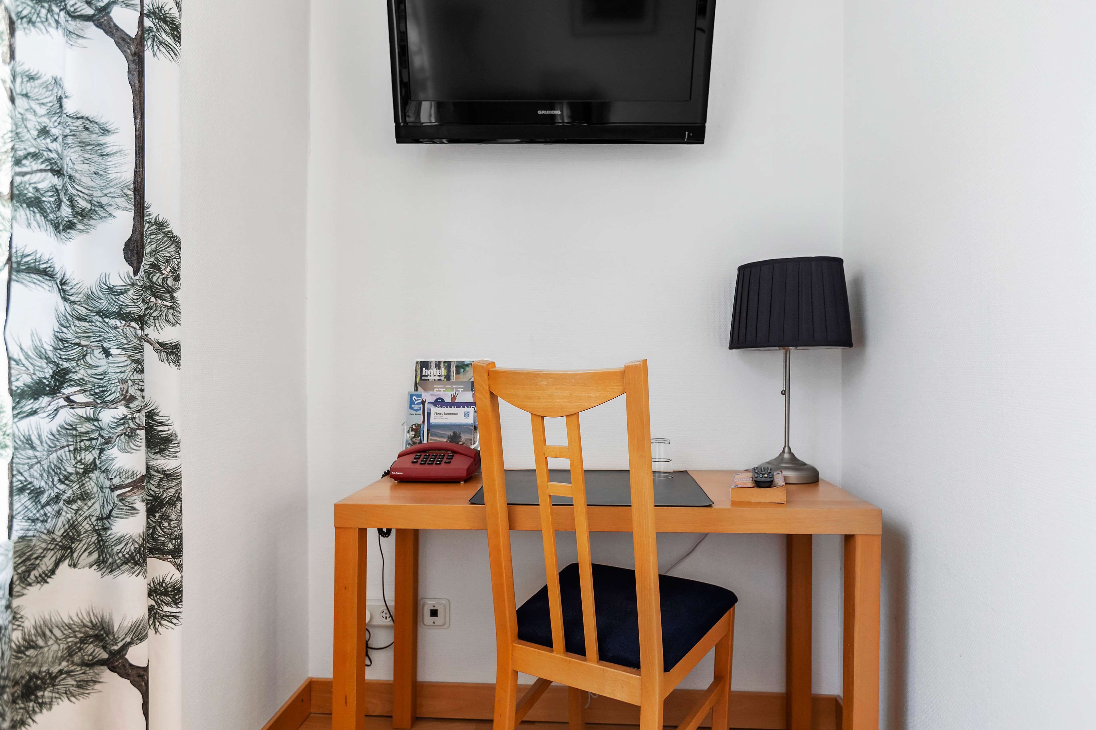 desk, laptop workspace, iron/ironing board, rollaway beds