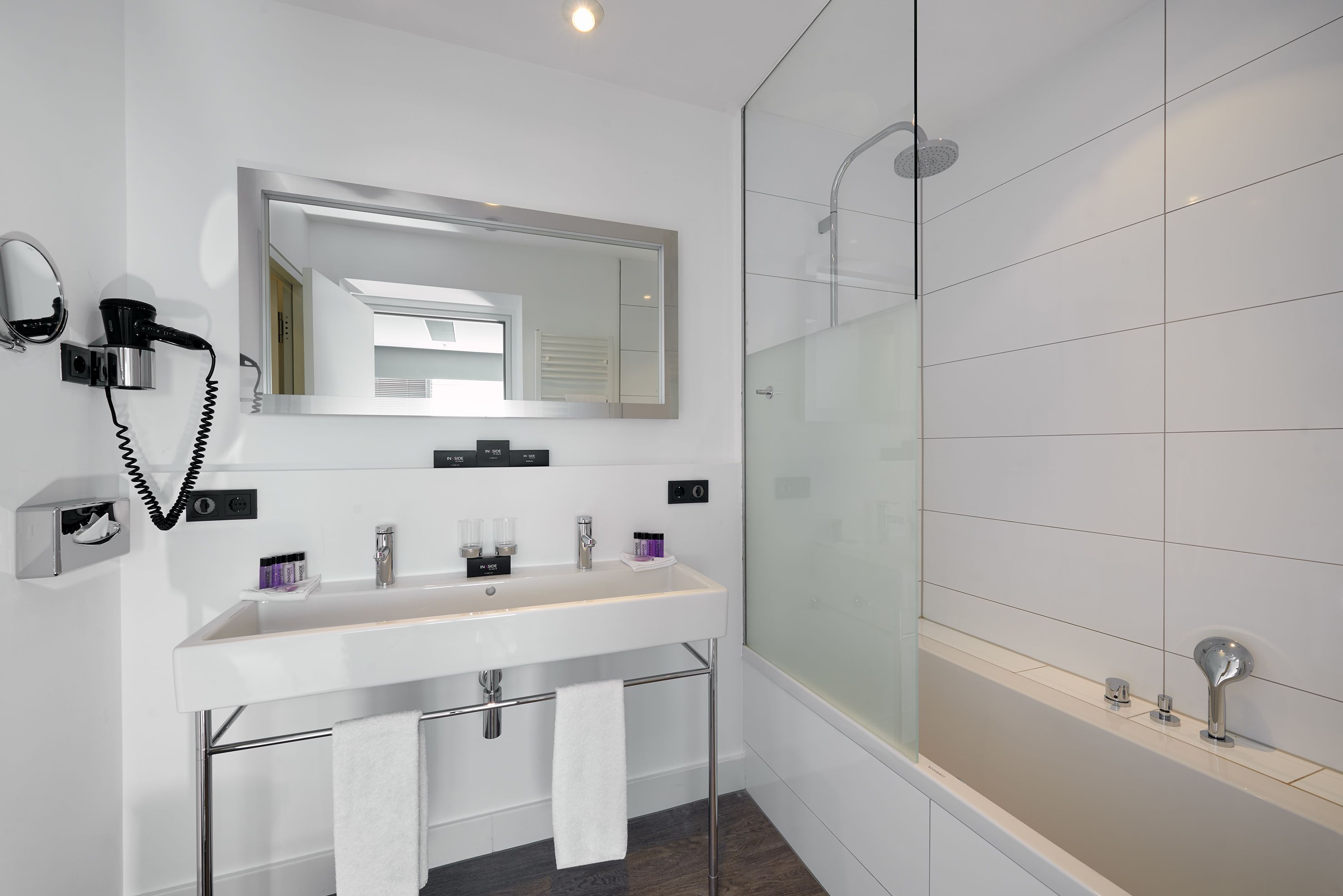 innside lifestyle suite | bathroom | shower, rainfall showerhead, eco-friendly toiletries, hair dryer