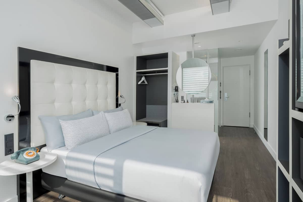 The Innside Guestroom | Premium bedding, minibar, desk, blackout curtains