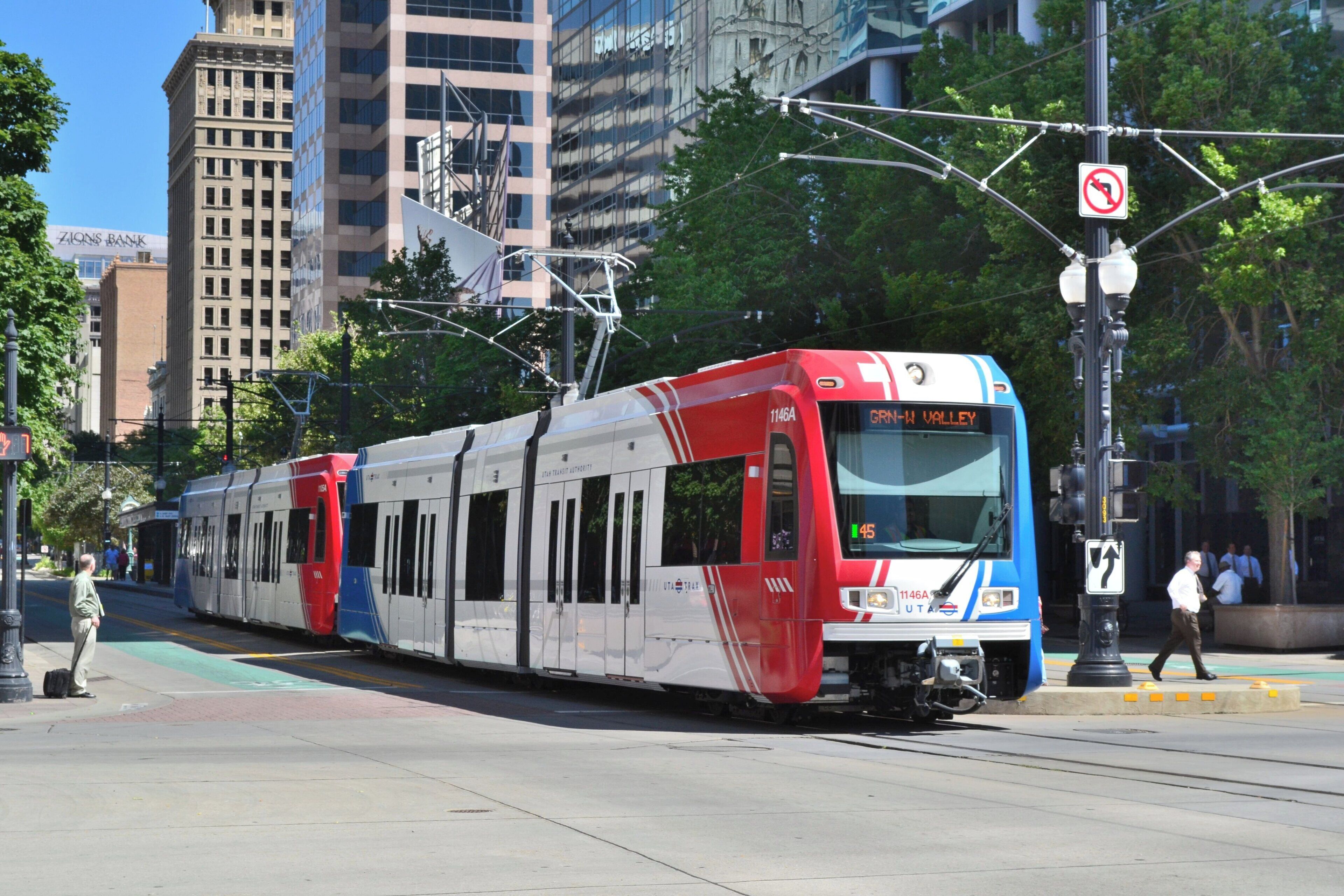 A tram with a digital display indicating its destination.