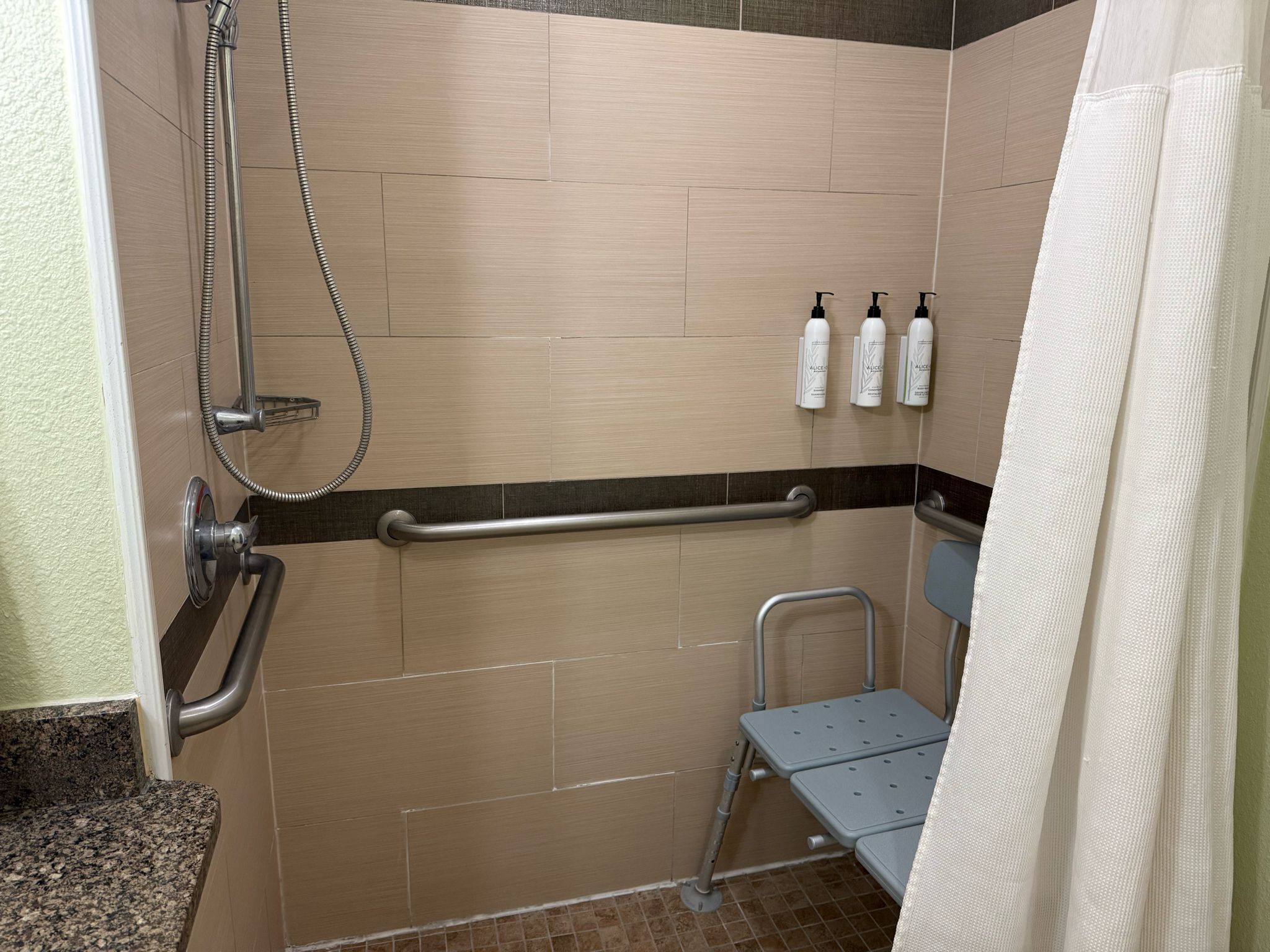 studio, 1 king bed (mobility/hearing accessible, tub) | bathroom | combined shower/bathtub, hair dryer, towels