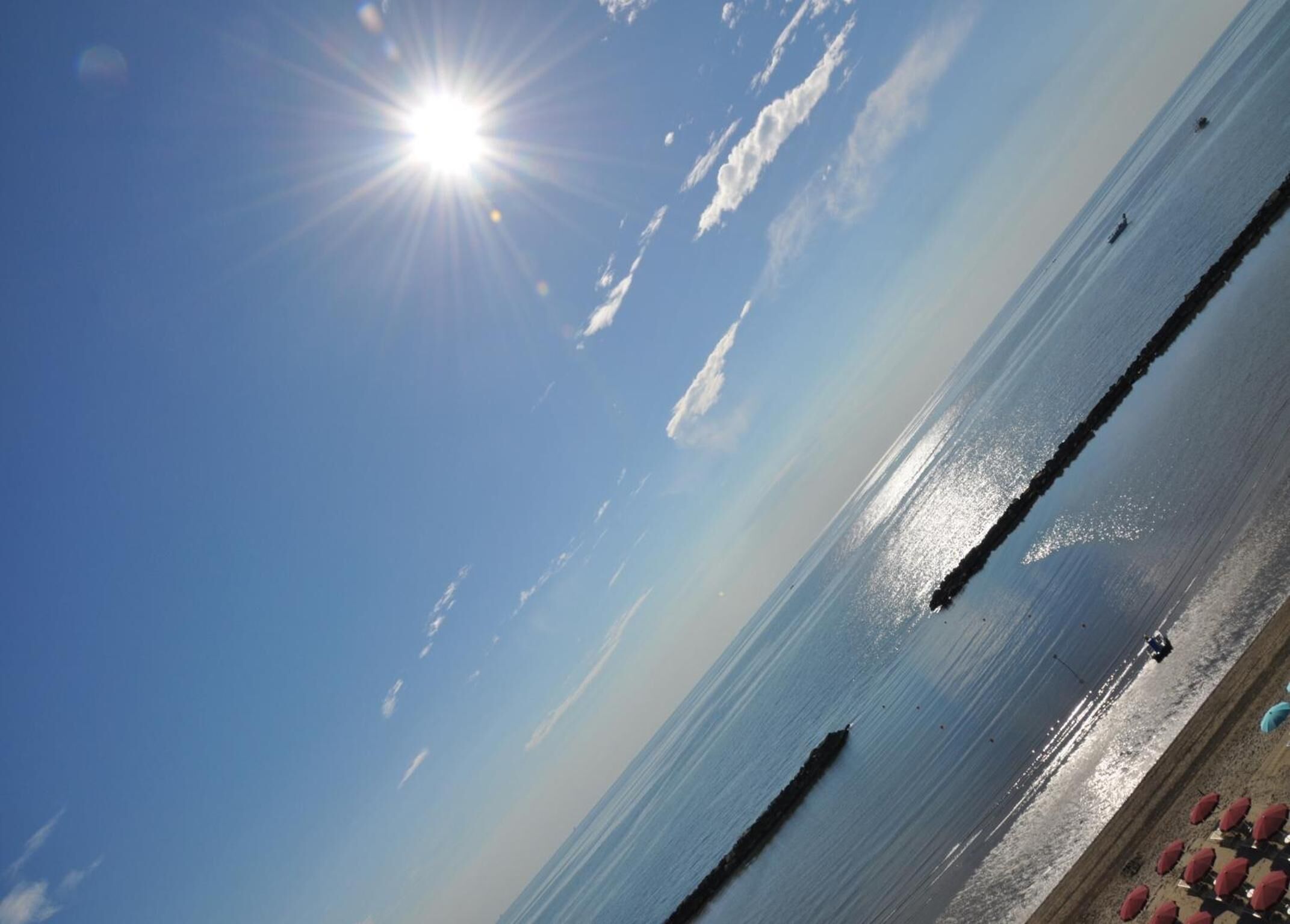 sun-loungers, beach umbrellas, beach towels