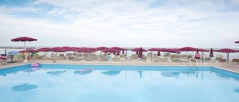 Outdoor pool, open 10:00 AM to 6:00 PM, pool umbrellas, sun loungers