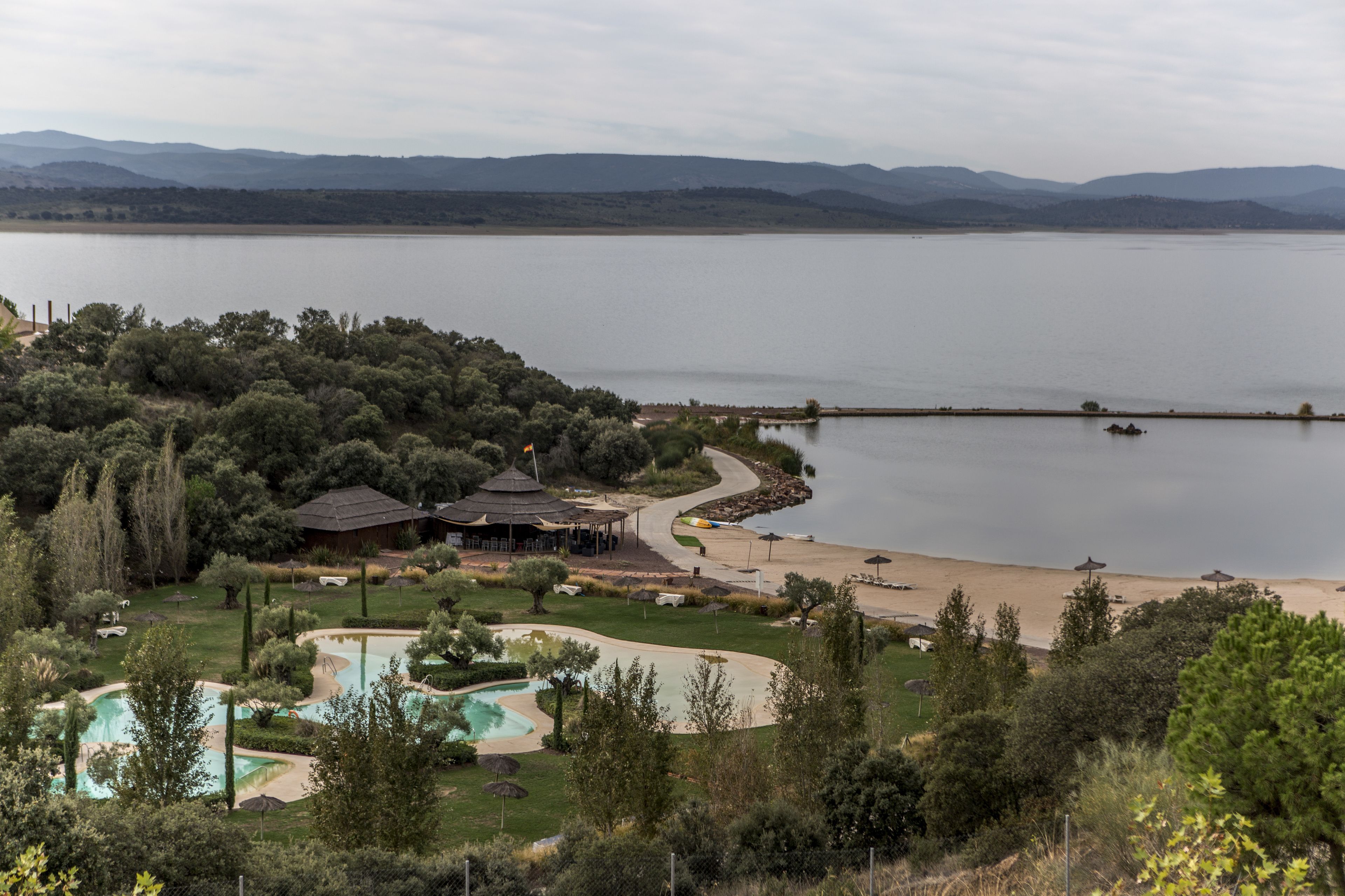 seasonal outdoor pool, pool umbrellas, pool loungers