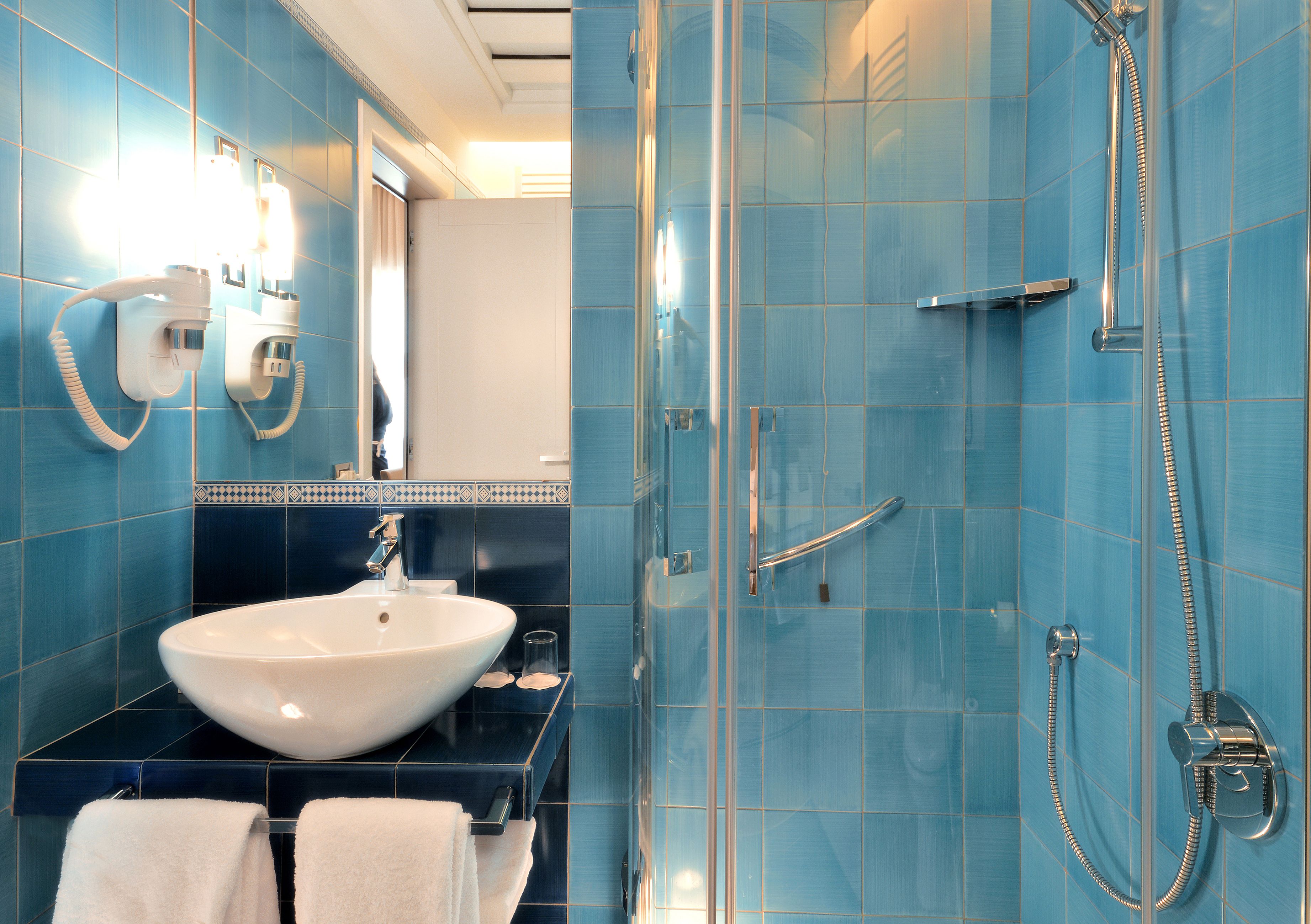 free toiletries, hair dryer, bidet, towels