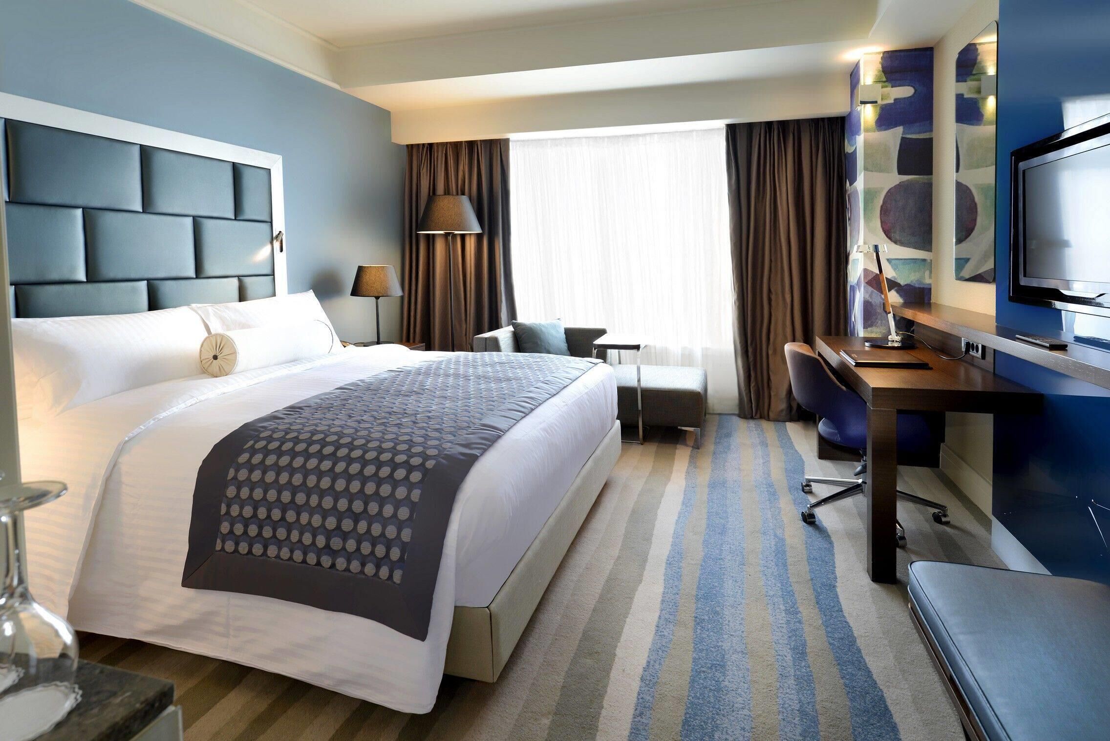 Premium bedding, pillow-top beds, in-room safe, desk