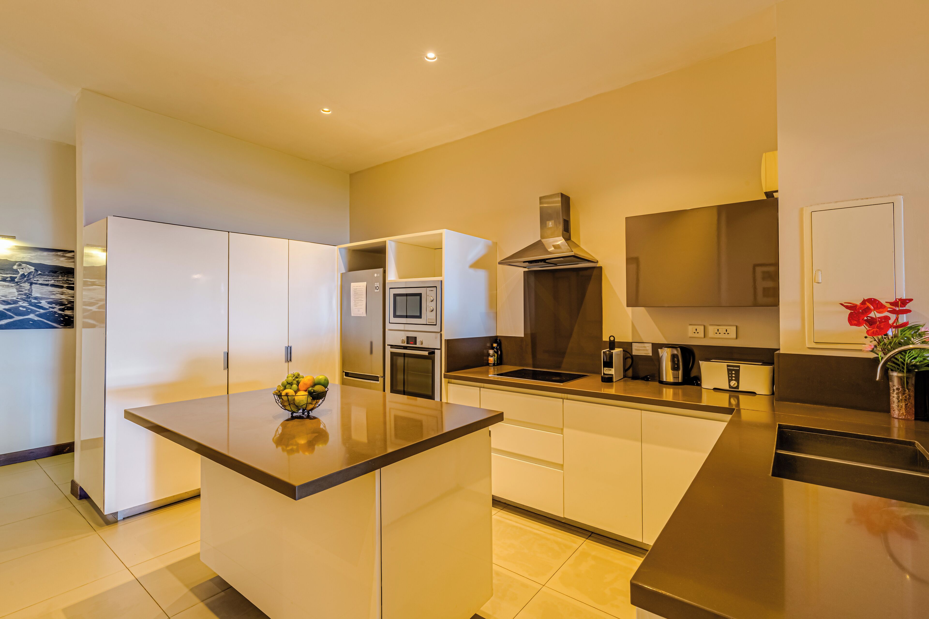 premium apartment | private kitchen | full-sized fridge, microwave, oven, stovetop