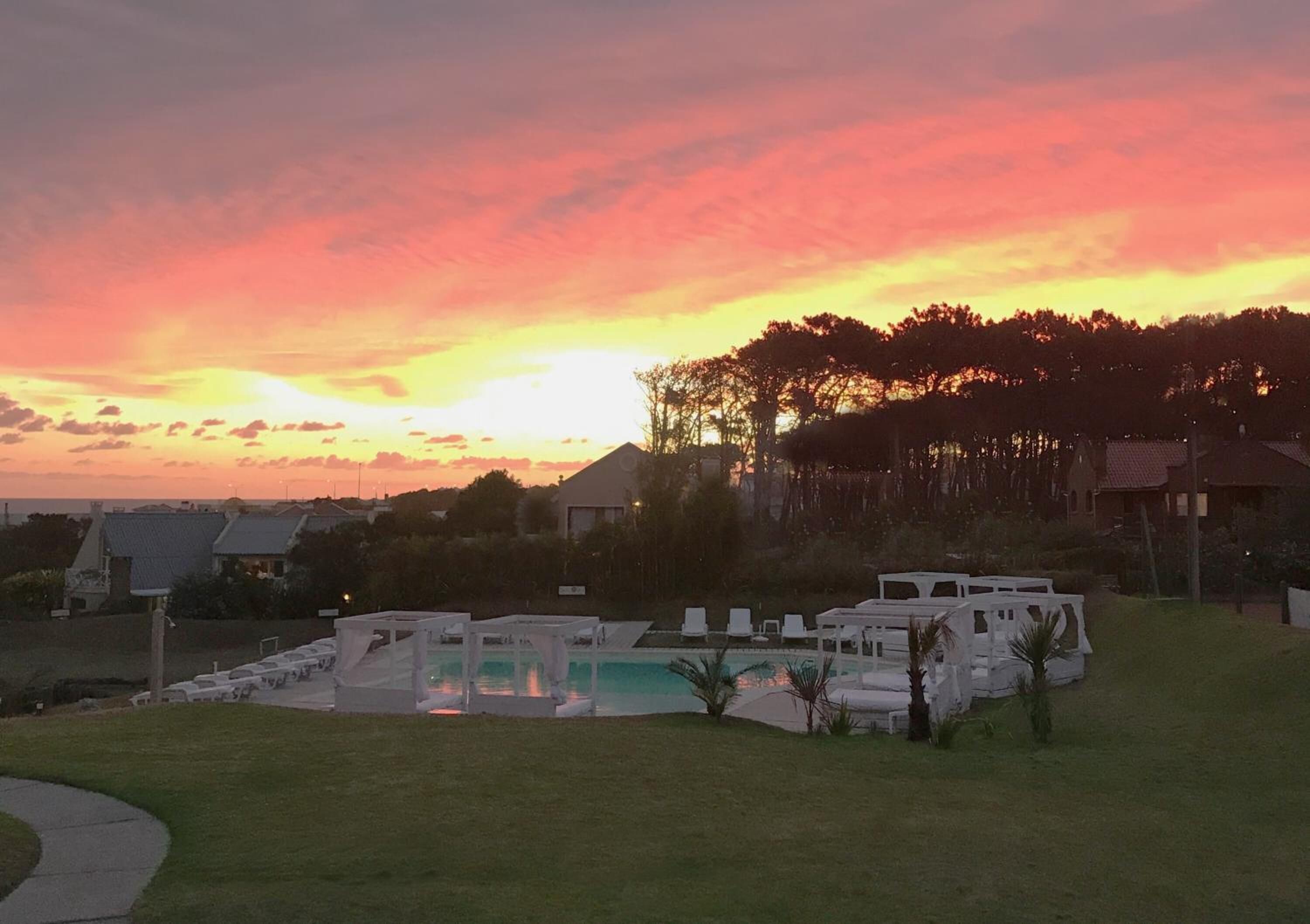 seasonal outdoor pool, pool umbrellas, pool loungers