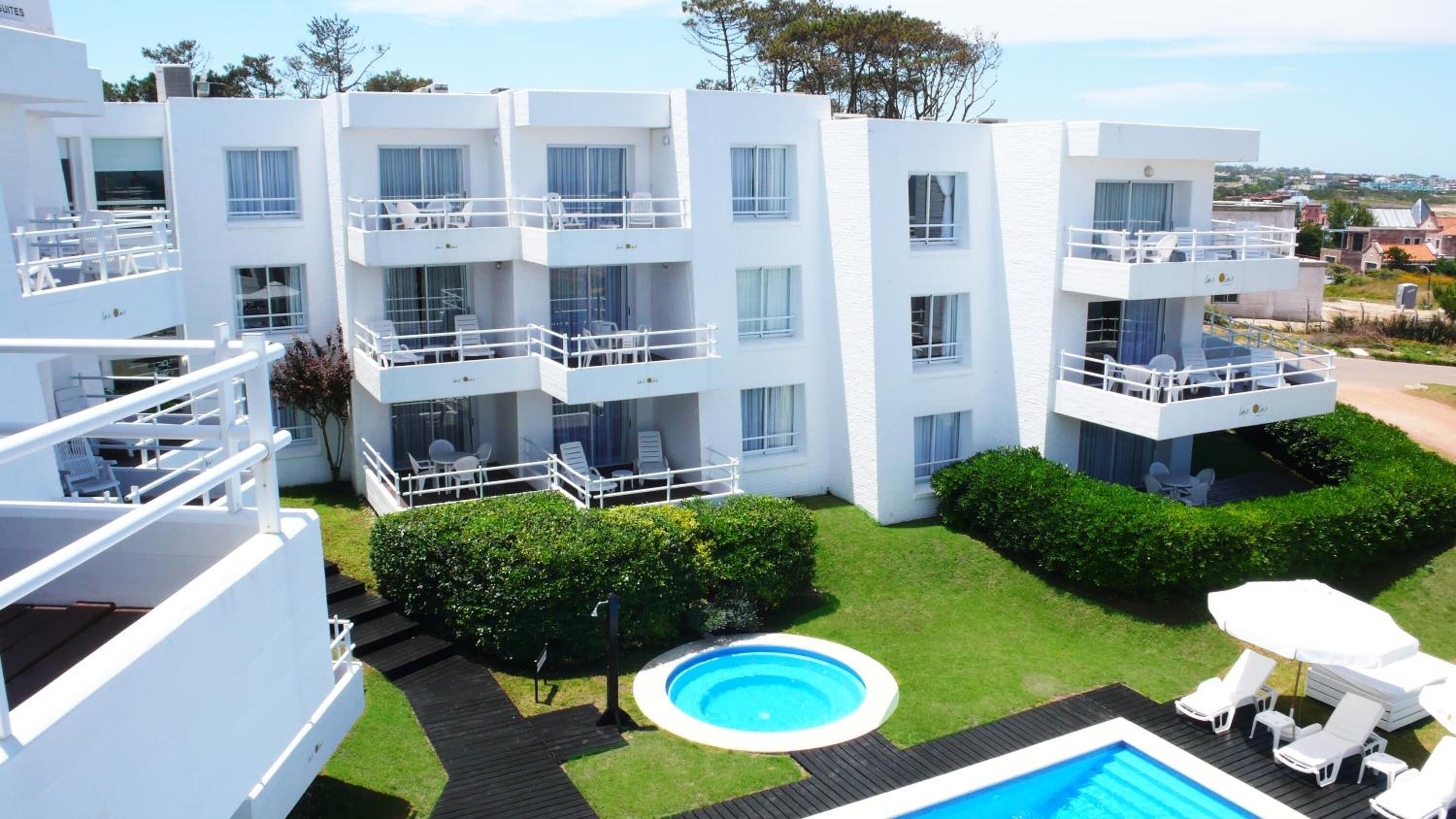 seasonal outdoor pool, pool umbrellas, pool loungers