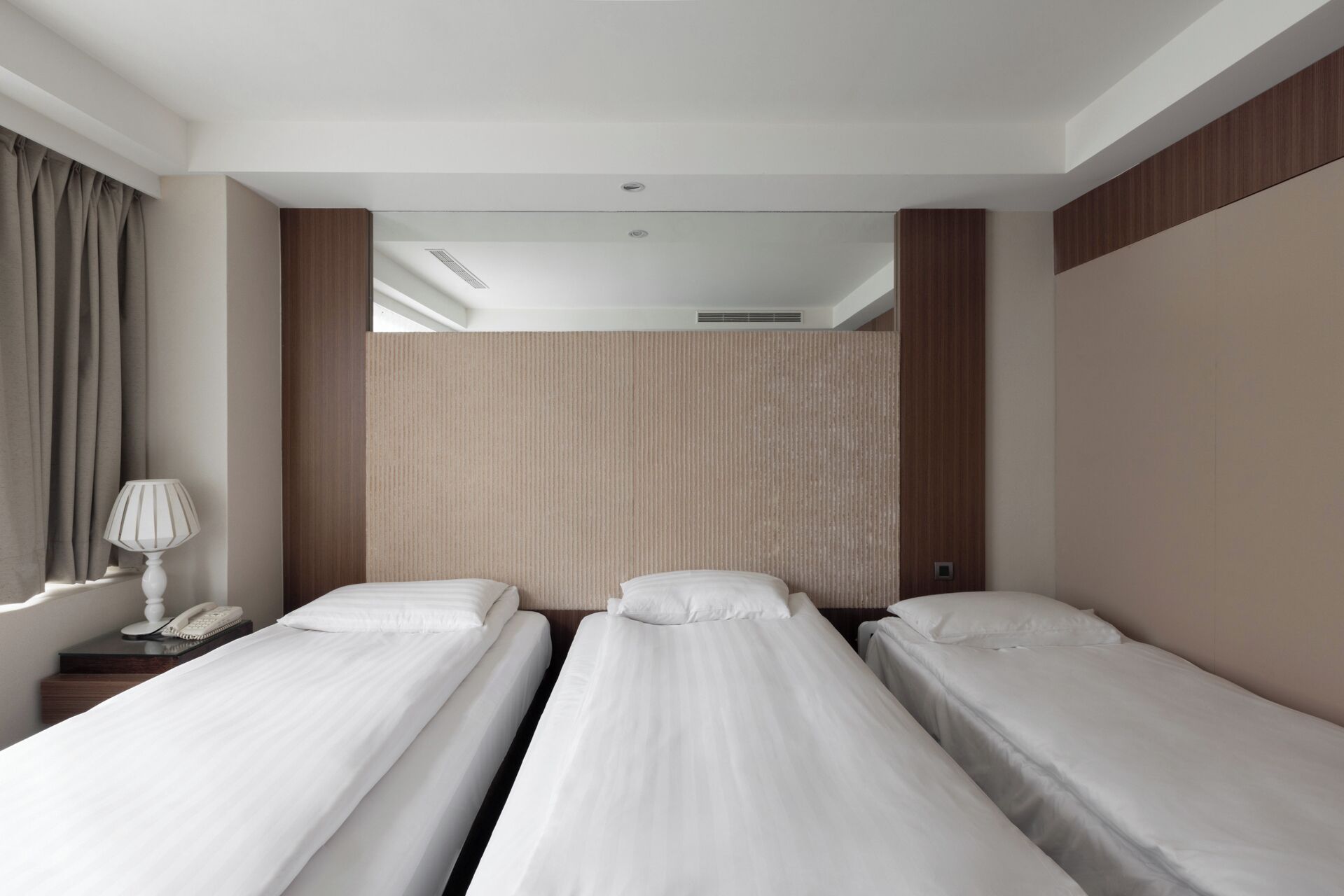 design twin room with extra bed | premium bedding, down duvets, in-room safe, desk