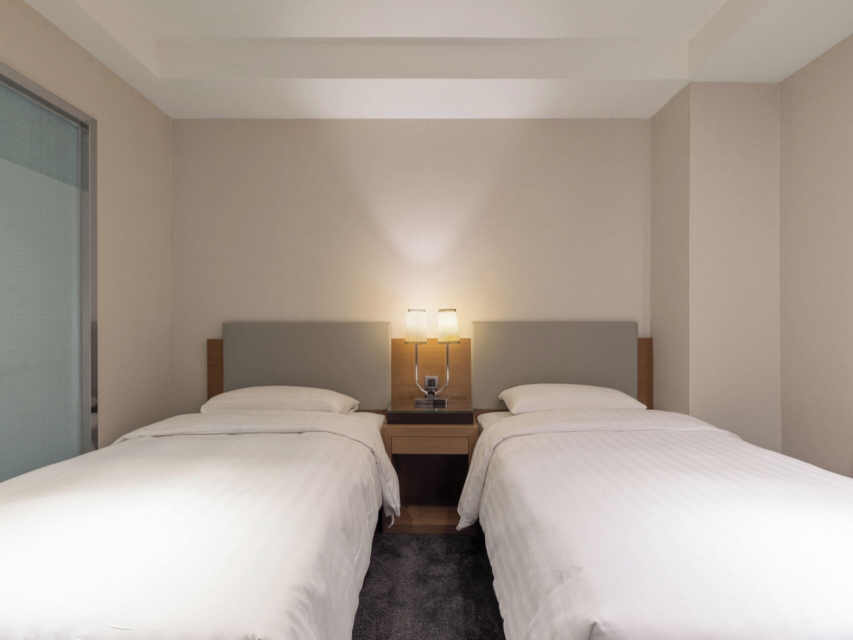 elite twin room, no windows | premium bedding, down duvets, in-room safe, desk