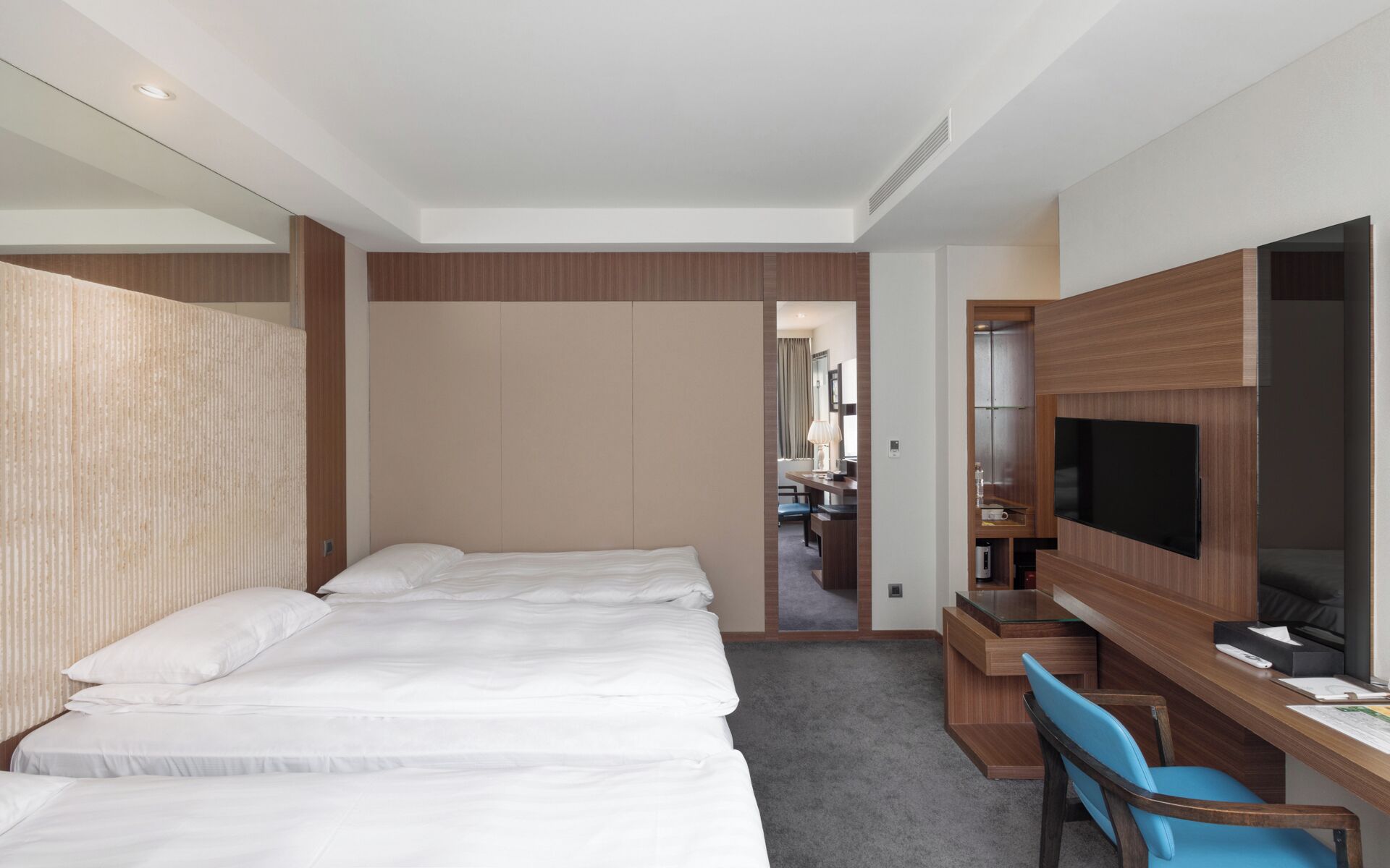 design twin room with extra bed | premium bedding, down duvets, in-room safe, desk