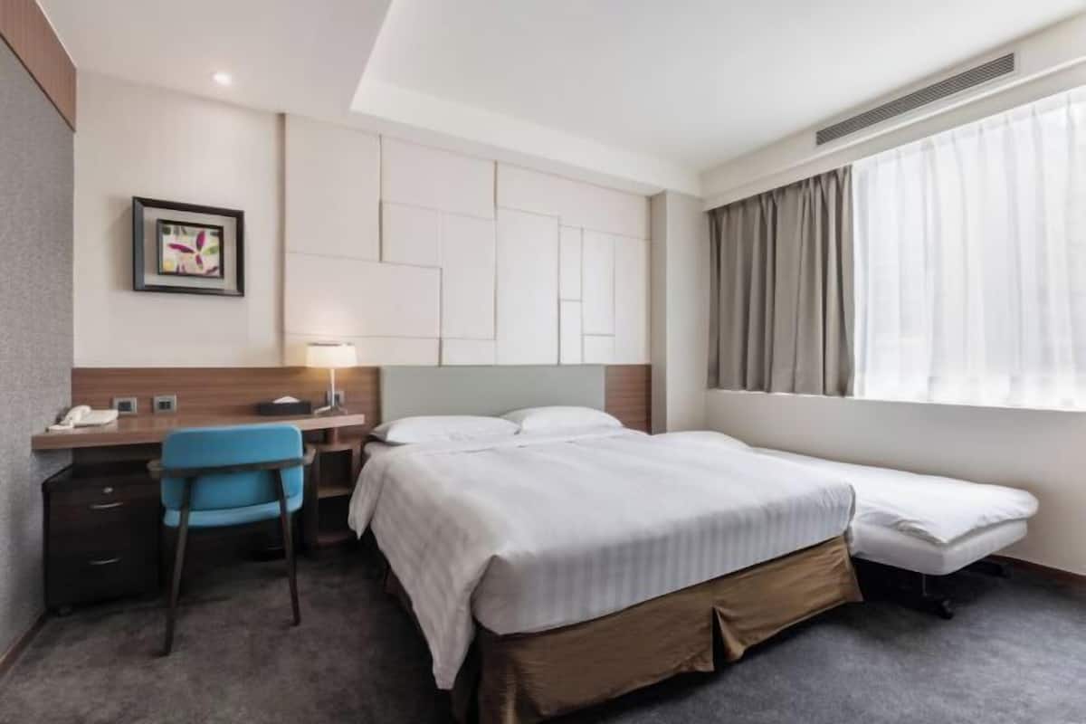 Premium bedding, down duvets, in-room safe, desk