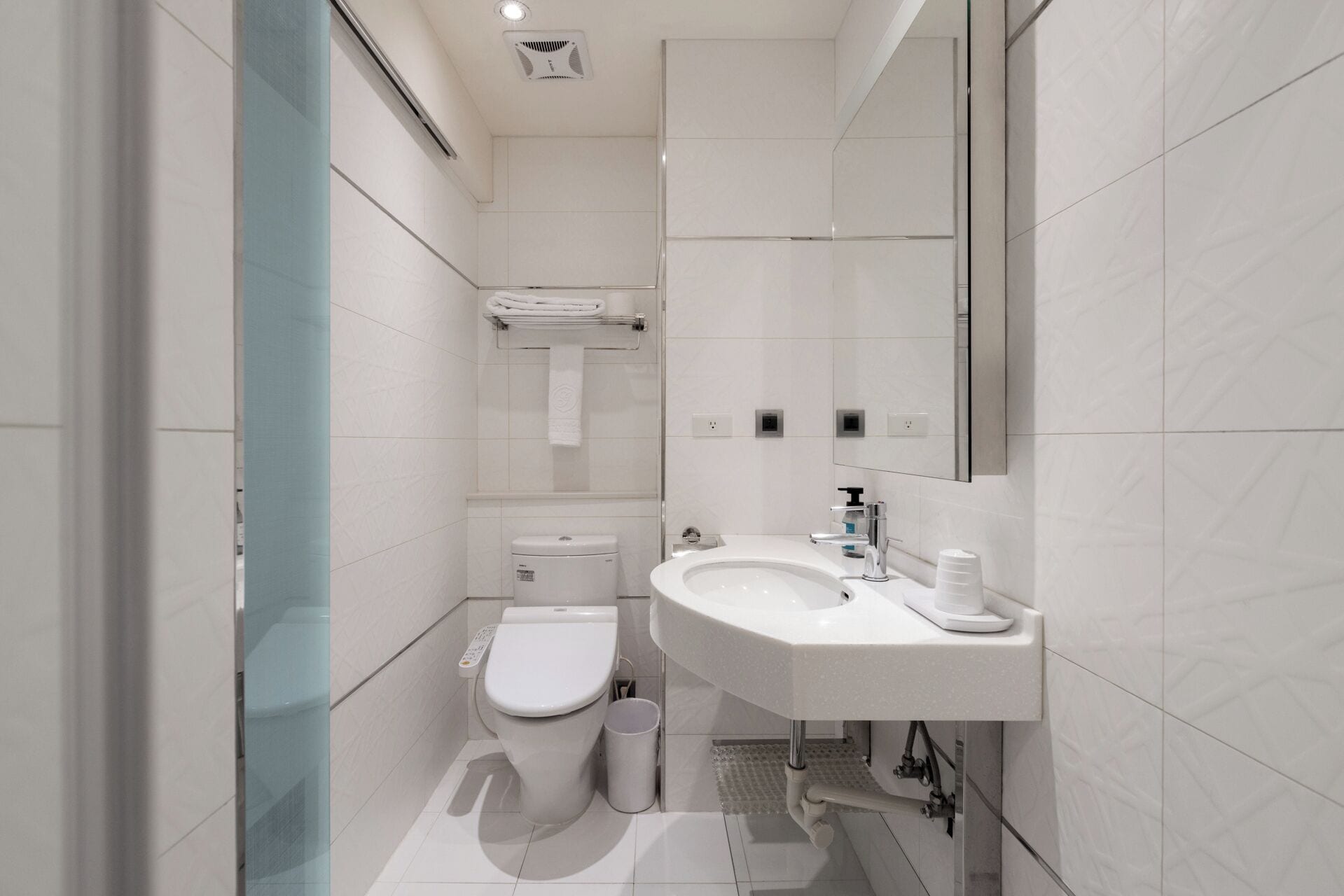 budget room, 1 single bed, no windows | bathroom | hair dryer, towels