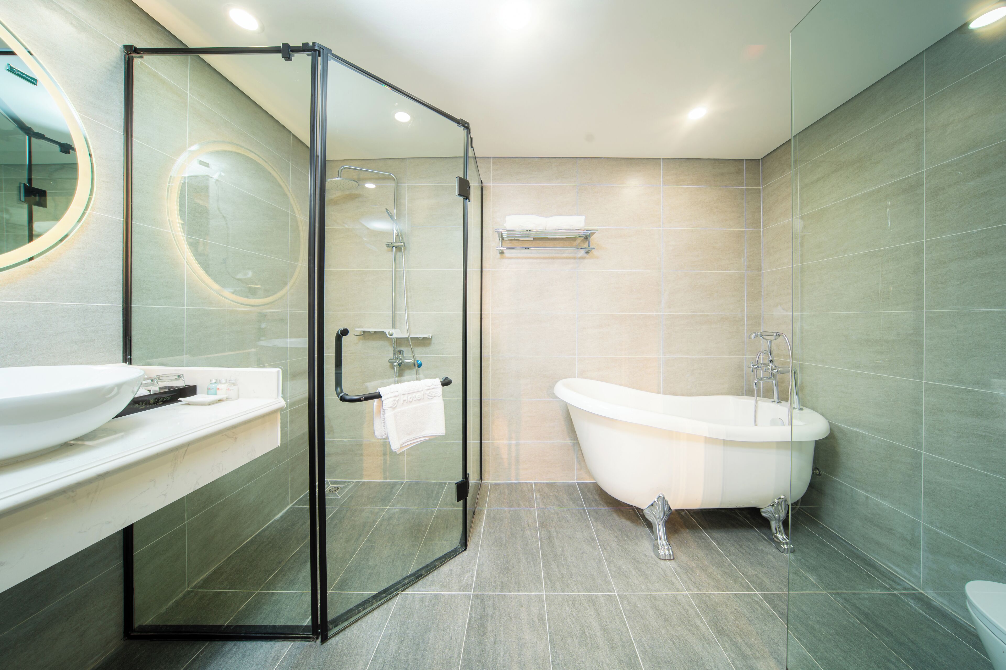 Suite, 1 King Bed | Bathroom | Combined shower/tub, deep soaking tub, rainfall showerhead