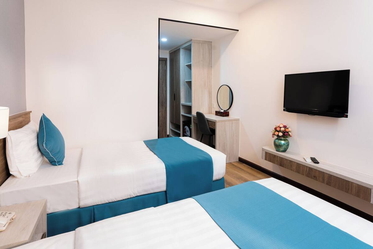 Memory foam beds, minibar, desk, laptop workspace