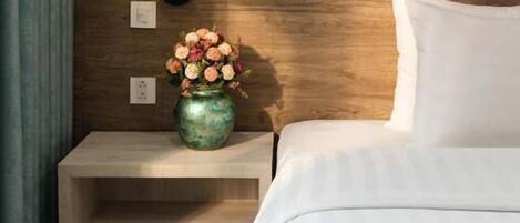 Memory-foam beds, minibar, desk, laptop workspace