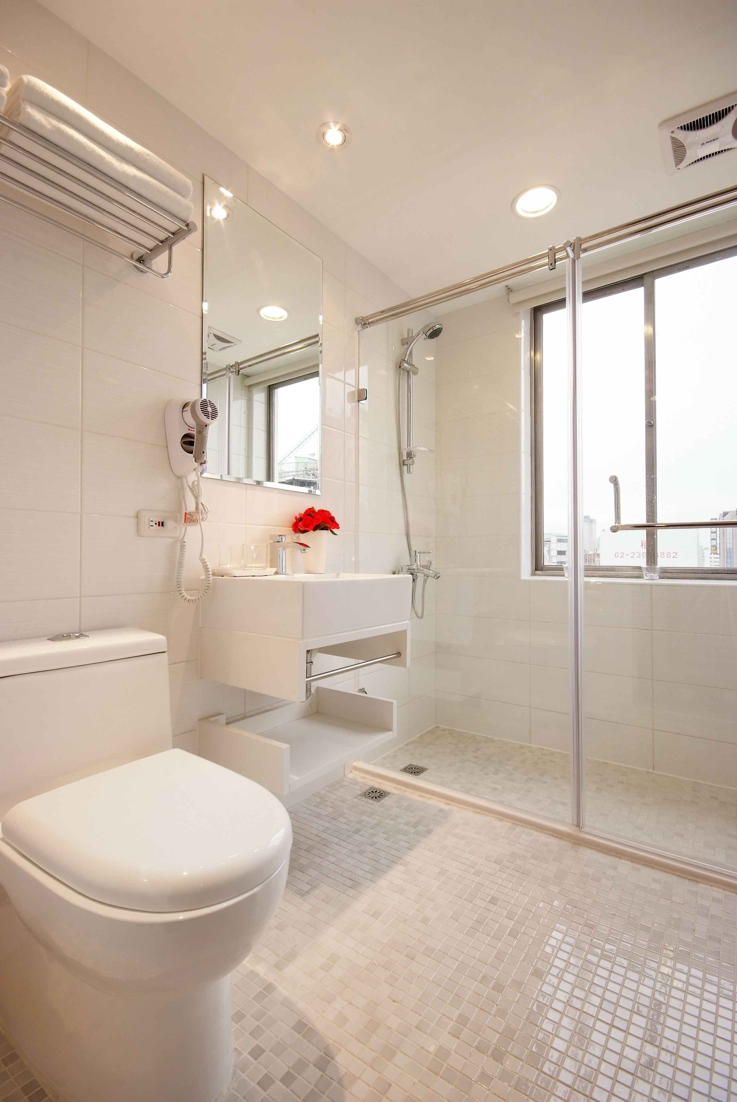 elite twin room | bathroom | shower, rainfall showerhead, free toiletries, hair dryer