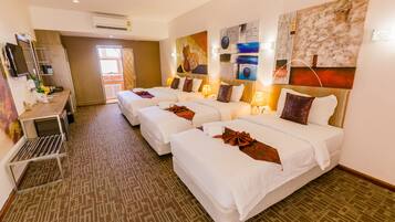 Standard Triple Room | Minibar, in-room safe, desk, rollaway beds