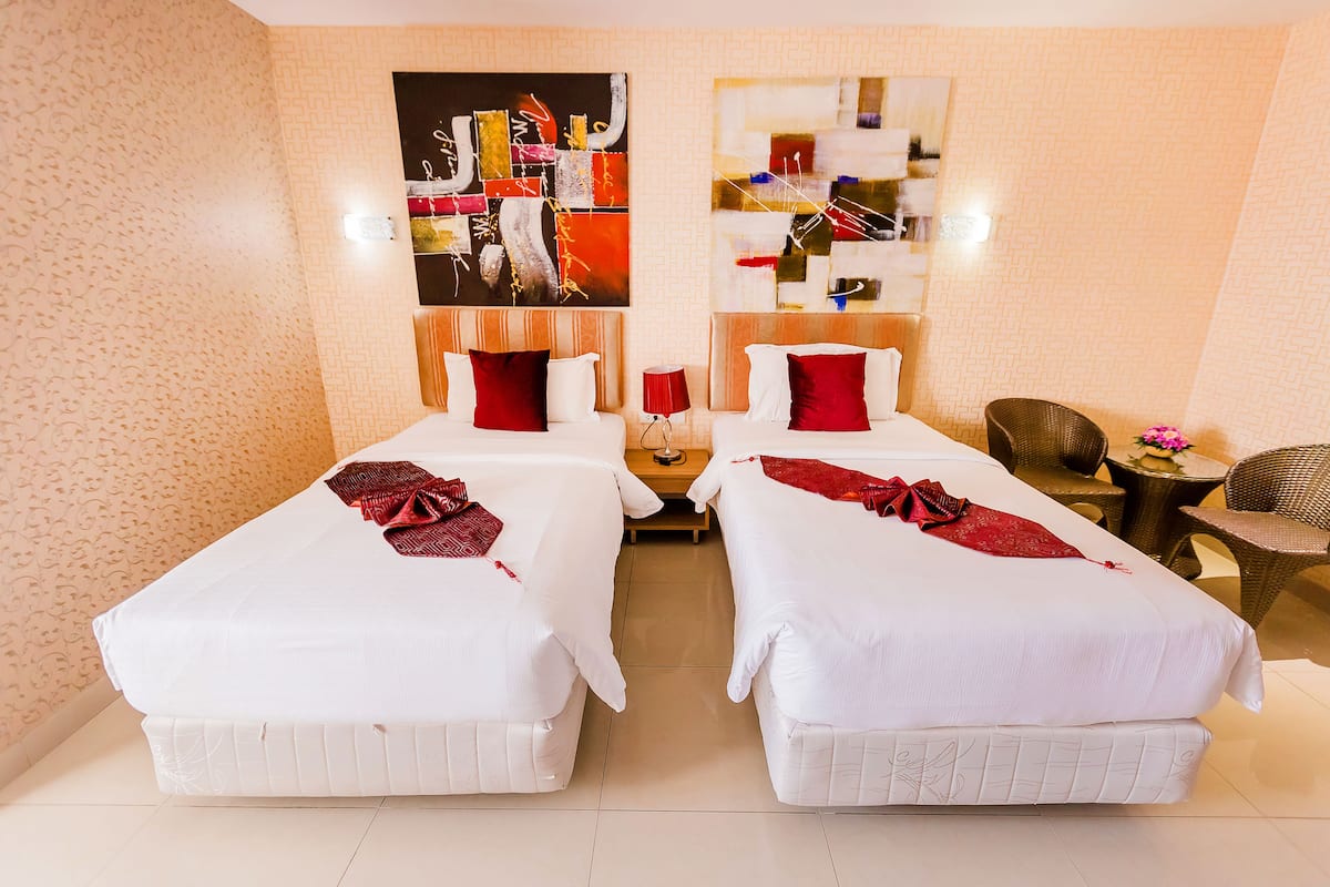 Superior Twin Room | Minibar, in-room safe, desk, rollaway beds