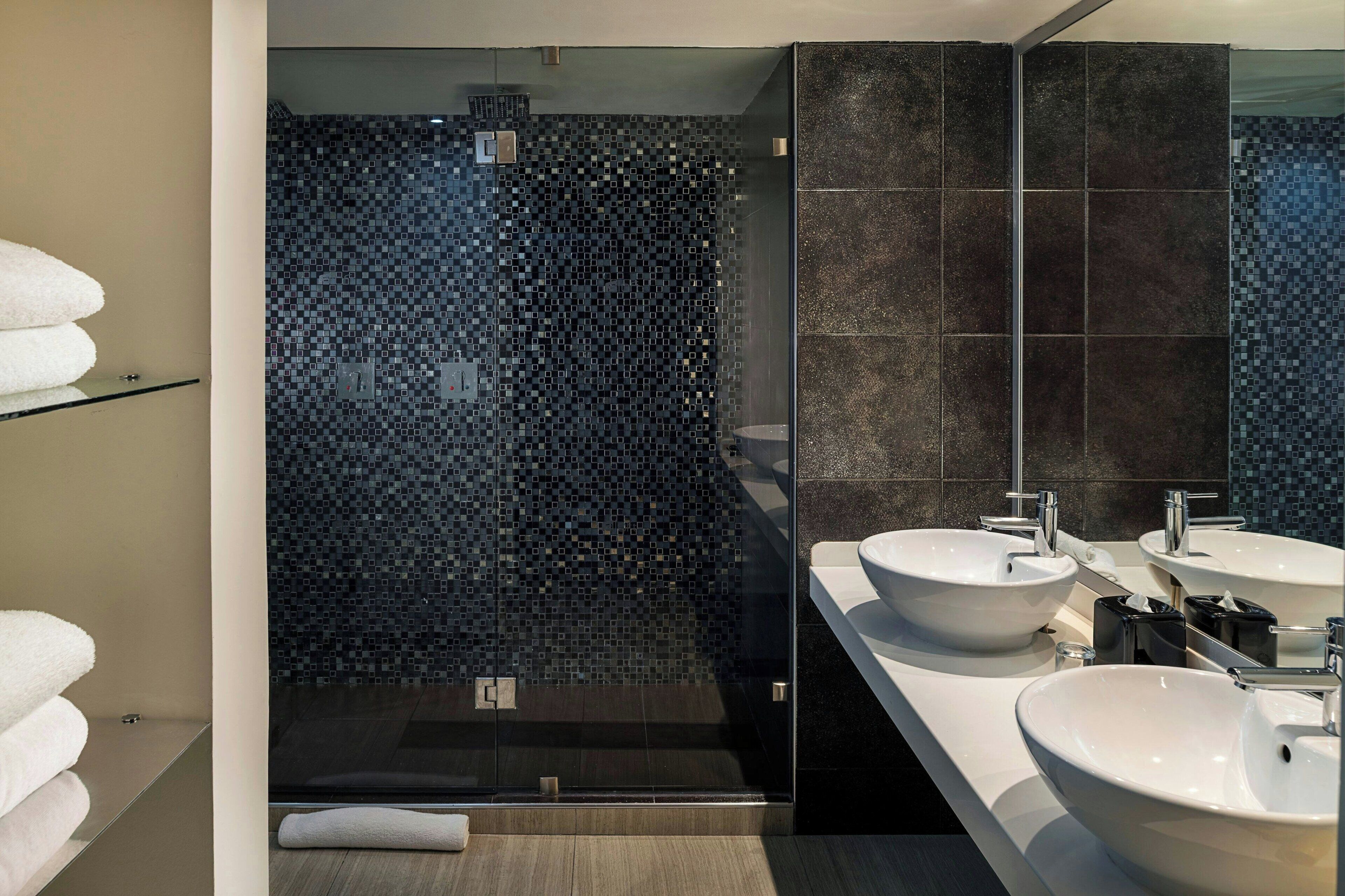 shower, rainfall showerhead, designer toiletries, hair dryer