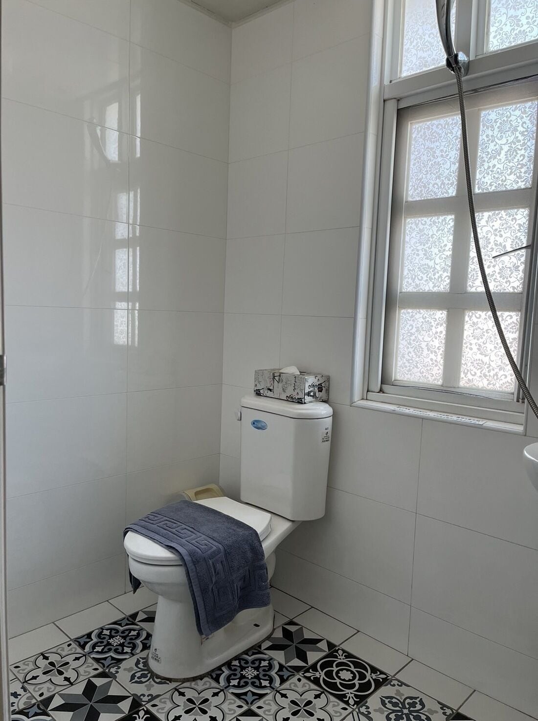 economy room 5, shared bathroom | bathroom | shower, free toiletries, hair dryer, slippers