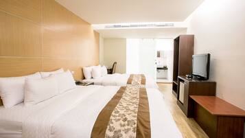 Family Room, No Windows | Down comforters, minibar, in-room safe, desk