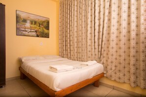 Cofres nos quartos, roupa de cama