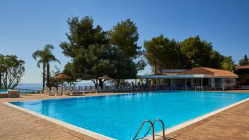 2 outdoor pools, open 10:00 AM to 7:00 PM, pool umbrellas, pool loungers
