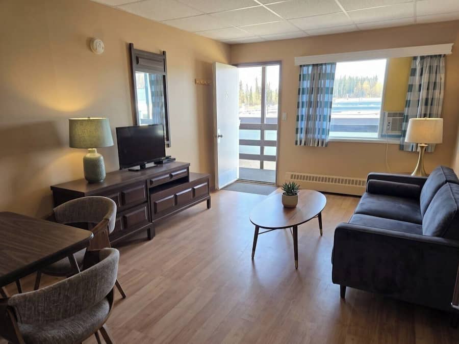 2-Bed Suite with Living Room and Full Kitchen | Living area | 42-inch LCD TV with cable channels, TV