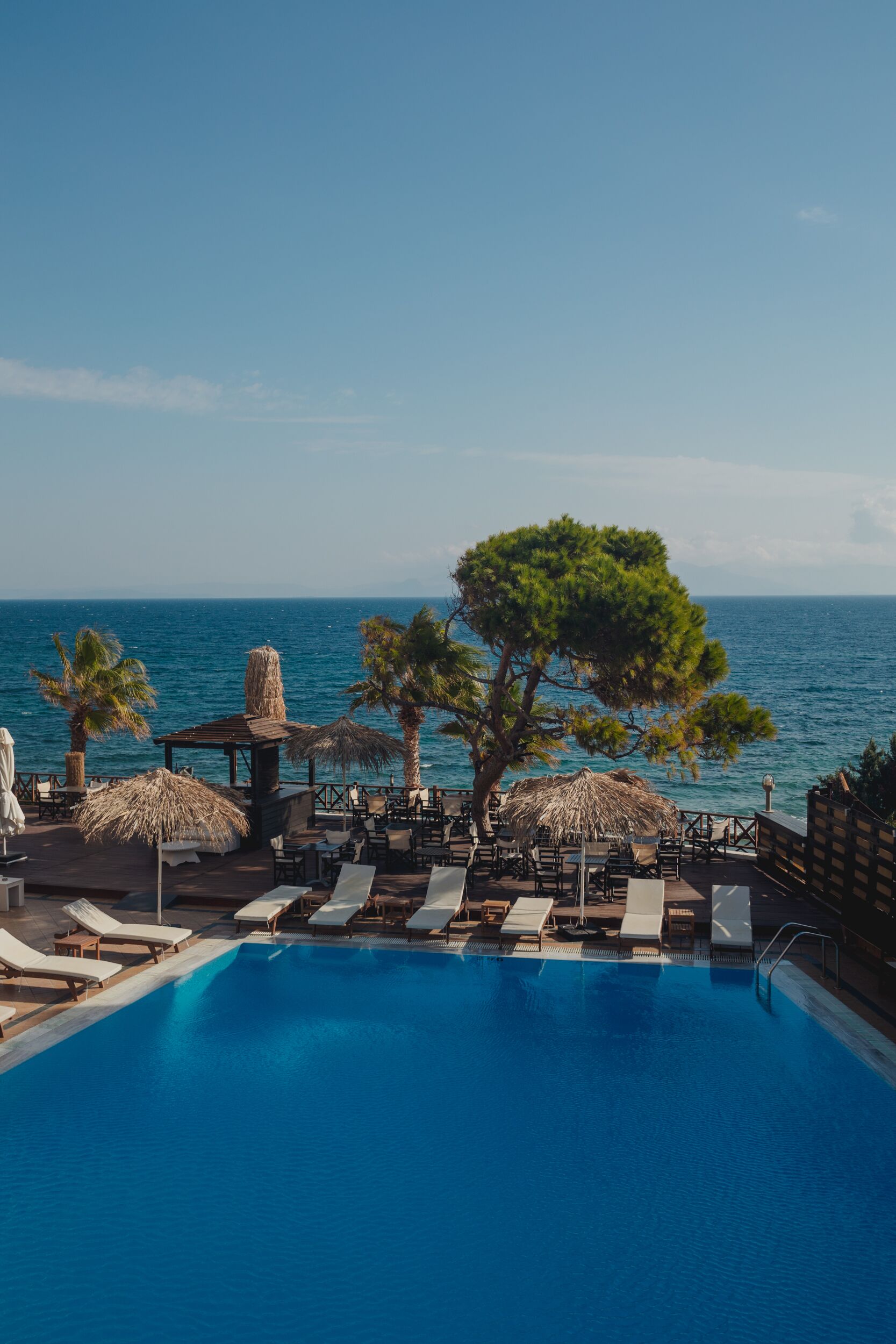 outdoor pool, pool umbrellas, pool loungers