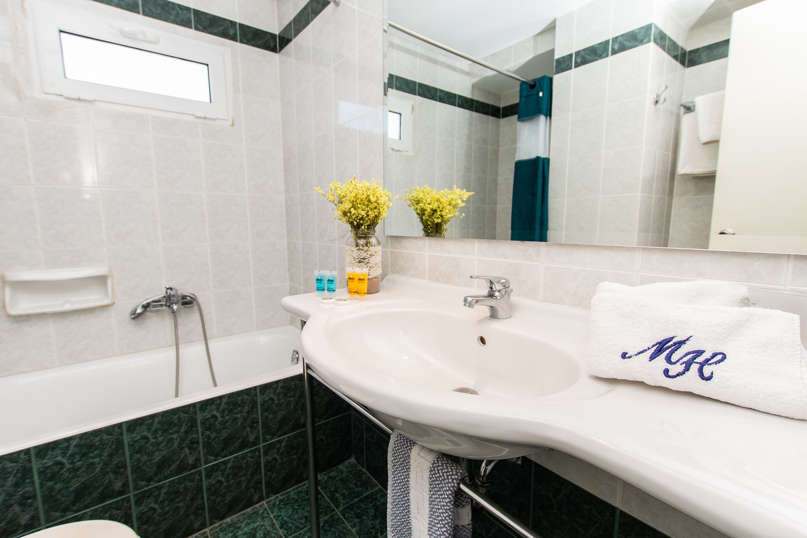 free toiletries, hair dryer, slippers, towels