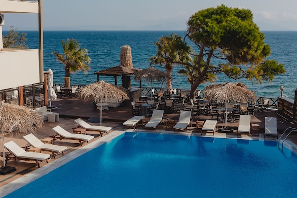 Outdoor pool, pool umbrellas, pool loungers